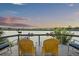 Relax on the deck with comfortable seating and enjoy breathtaking water views at 4940 Lambs Rd, North Charleston, SC 29418