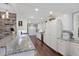 Bright, eat-in kitchen with granite countertops and white cabinets at 4940 Lambs Rd, North Charleston, SC 29418