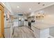 Well-lit kitchen featuring stainless steel appliances, white cabinets, and granite counters at 4940 Lambs Rd, North Charleston, SC 29418
