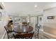Open concept living room showing wood style floors, cozy furniture, and lots of light at 4940 Lambs Rd, North Charleston, SC 29418
