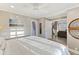 The main bedroom is bright and spacious with views into the living room at 4940 Lambs Rd, North Charleston, SC 29418