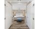 A bright main bedroom features a bed with white linens and decorative molding on the walls at 4940 Lambs Rd, North Charleston, SC 29418