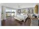 Serene main bedroom with access to the deck, offering beautiful water views at 4940 Lambs Rd, North Charleston, SC 29418