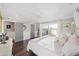 Bright main bedroom with water views, access to a private balcony, and a serene color palette at 4940 Lambs Rd, North Charleston, SC 29418