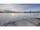 Scenic water view from the dock, featuring a tranquil river and picturesque sunset at 4940 Lambs Rd, North Charleston, SC 29418