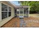 This home features a large screened porch area that opens up into a fenced-in backyard at 5024 Blair Rd, Summerville, SC 29483
