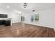 A spacious living room with sleek wood floors, natural light, and an open floor plan at 5024 Blair Rd, Summerville, SC 29483