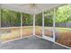 This screened porch offers privacy and protection from the elements at 5024 Blair Rd, Summerville, SC 29483