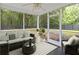 Relax on the screened porch overlooking the lush backyard and enjoy the view at 5024 Blair Rd, Summerville, SC 29483