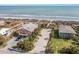 Stunning aerial view of beachfront homes with ample parking and beach access at 504 W Ashley Ave, Folly Beach, SC 29439
