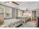 Shared bedroom featuring two beds, soft lighting, and a calming color scheme for a serene atmosphere at 504 W Ashley Ave, Folly Beach, SC 29439