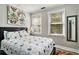 Cozy bedroom featuring a comfortable bed, soft lighting, and serene decor creating a relaxing retreat at 504 W Ashley Ave, Folly Beach, SC 29439