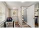Functional mudroom features a convenient door to the outside, with laundry area and access to a half bath at 504 W Ashley Ave, Folly Beach, SC 29439