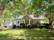 Charming single-story home with lush landscaping and mature trees in a desirable neighborhood at 5079 Coral Reef Dr, Johns Island, SC 29455