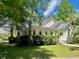 Inviting single-story home featuring well-maintained landscaping and classic architectural details at 5079 Coral Reef Dr, Johns Island, SC 29455