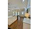 Bright kitchen featuring quartz countertops, island with a sink, and plenty of counter space at 5079 Coral Reef Dr, Johns Island, SC 29455