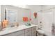 Bright bathroom with a single sink vanity and combined shower and tub at 525 Yellow Tower Ter, Charleston, SC 29412