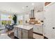 Bright kitchen with white cabinets, center island, and breakfast table by window at 525 Yellow Tower Ter, Charleston, SC 29412