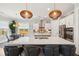 Open kitchen with stainless steel appliances, large island, and pendant lighting at 525 Yellow Tower Ter, Charleston, SC 29412