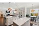 Modern kitchen with large island, open to the living room and dining area at 525 Yellow Tower Ter, Charleston, SC 29412