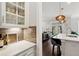 Open kitchen featuring white marble countertops, subway tile backsplash, and modern pendant lights at 525 Yellow Tower Ter, Charleston, SC 29412