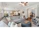 Spacious living room with comfortable seating, area rug, and open floor plan into kitchen at 525 Yellow Tower Ter, Charleston, SC 29412