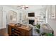 Comfortable living room with fireplace, wine storage, and decorative wall hangings at 525 Yellow Tower Ter, Charleston, SC 29412