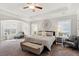 Spacious bedroom with tray ceilings, natural light, and cozy furnishings, offering a peaceful retreat at 525 Yellow Tower Ter, Charleston, SC 29412