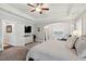 Serene bedroom featuring a TV, soft lighting, and a seating area, perfect for a restful experience at 525 Yellow Tower Ter, Charleston, SC 29412