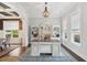Stylish home office featuring a large desk, custom shelving, and plenty of natural light at 525 Yellow Tower Ter, Charleston, SC 29412