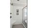 Modern shower with marble tile, built-in niche, and rainfall showerhead at 525 Yellow Tower Ter, Charleston, SC 29412