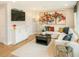 Living room with modern decor, a large sectional sofa, and stylish accent pieces at 552 Scholar Way, Summerville, SC 29486