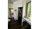Bedroom with closet and desk at 5681 Captain Kidd Rd, Hollywood, SC 29449
