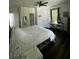 Bedroom with dark wood floors, neutral walls, and natural light at 5681 Captain Kidd Rd, Hollywood, SC 29449