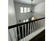 Open living room featuring high ceilings, a modern fan, and natural lighting at 5681 Captain Kidd Rd, Hollywood, SC 29449