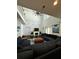 Bright living room with vaulted ceilings, a fireplace and a sectional sofa at 5681 Captain Kidd Rd, Hollywood, SC 29449