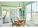 Sunny breakfast nook with scenic views and easy porch access at 6159 Fieldstone Cir, Charleston, SC 29414
