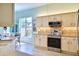 Well-equipped kitchen with stainless steel appliances and tiled backsplash at 6159 Fieldstone Cir, Charleston, SC 29414