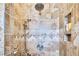 Walk-in shower featuring decorative tile and built-in shower caddy at 6159 Fieldstone Cir, Charleston, SC 29414