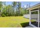 Spacious backyard with a well-maintained lawn and a privacy fence providing seclusion at 715 Hilchot Dr, Summerville, SC 29486