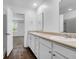 Bright bathroom with a double sink vanity and modern fixtures and view to bedroom at 715 Hilchot Dr, Summerville, SC 29486