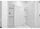 Clean, well-lit shower stall featuring shelves and tiled walls at 715 Hilchot Dr, Summerville, SC 29486