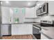 Modern kitchen with stainless steel appliances, ample counter space, and a functional layout at 715 Hilchot Dr, Summerville, SC 29486
