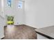 Bright, open living room with hardwood floors and sliding glass doors to the backyard at 715 Hilchot Dr, Summerville, SC 29486