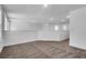 Open loft area featuring neutral carpet, recessed lighting, and white walls at 715 Hilchot Dr, Summerville, SC 29486