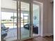 Inviting screened porch furnished with comfortable seating, perfect for enjoying outdoor living at 754 Blue Iris Way, Summerville, SC 29486
