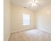Neutral bedroom with carpet, ceiling fan, and a window for natural light at 7812 Spring Creek Rd, North Charleston, SC 29418