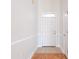 Bright foyer featuring tile flooring and a view of the front door at 7812 Spring Creek Rd, North Charleston, SC 29418