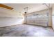 Spacious two car garage with an automatic door and ample room for storage and vehicles at 7812 Spring Creek Rd, North Charleston, SC 29418