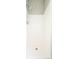 Clean, white-tiled shower with a chrome shower head and faucet at 7812 Spring Creek Rd, North Charleston, SC 29418